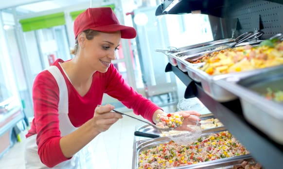 School nutrition program worker in the kitchen