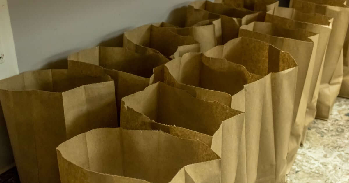 brown paper breakfast bags lined up