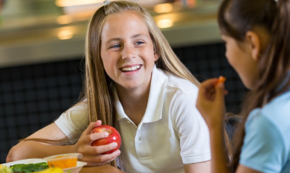 Students eating in school lunchroom
