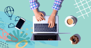 Person's Hands Typing on a laptop with coffee, donut and smartphone nearby online school registration k12 schools