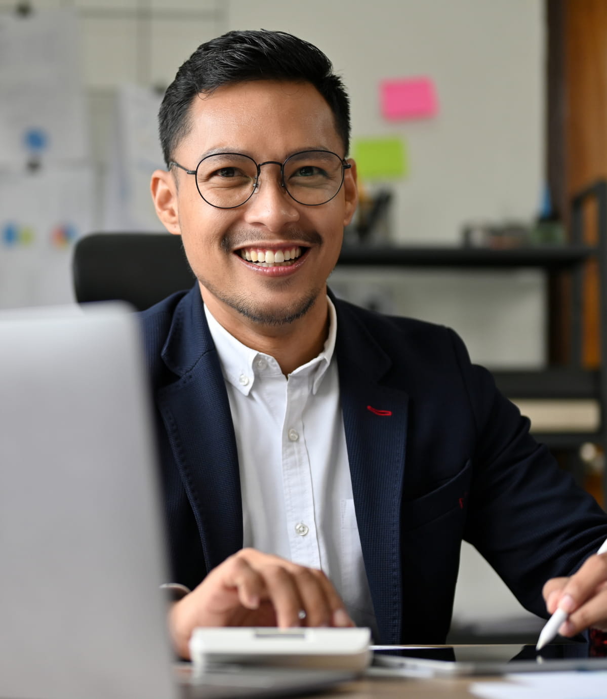 Chief Financial Officer at his desk