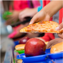 Pizza and apple on a school lunchroom tray