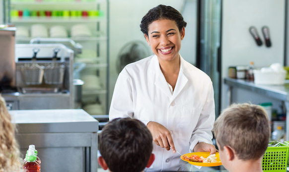 Happy school lunchroom employee